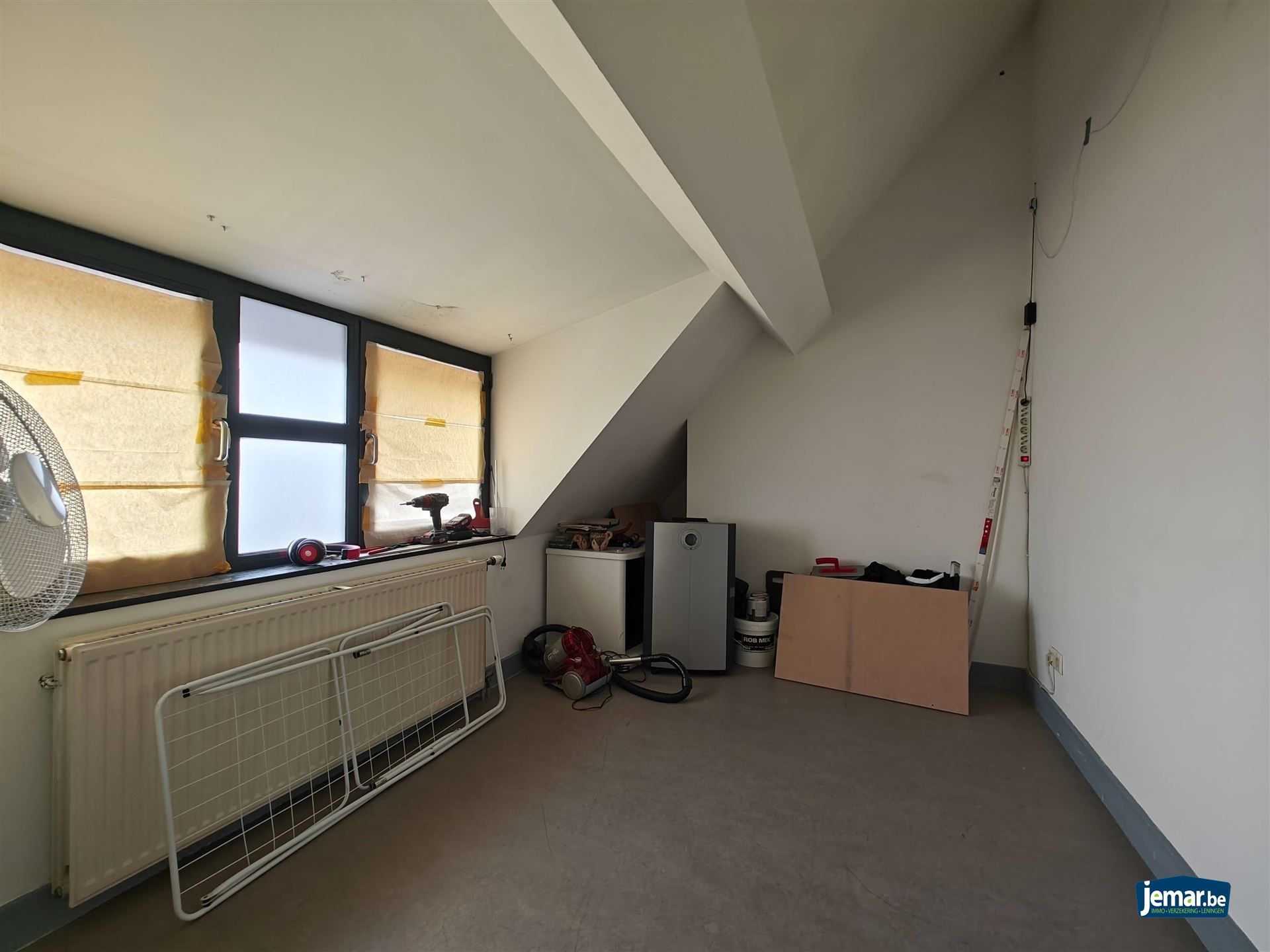 AANDELENOVERDRACHT: Handelspand met appartement foto 26