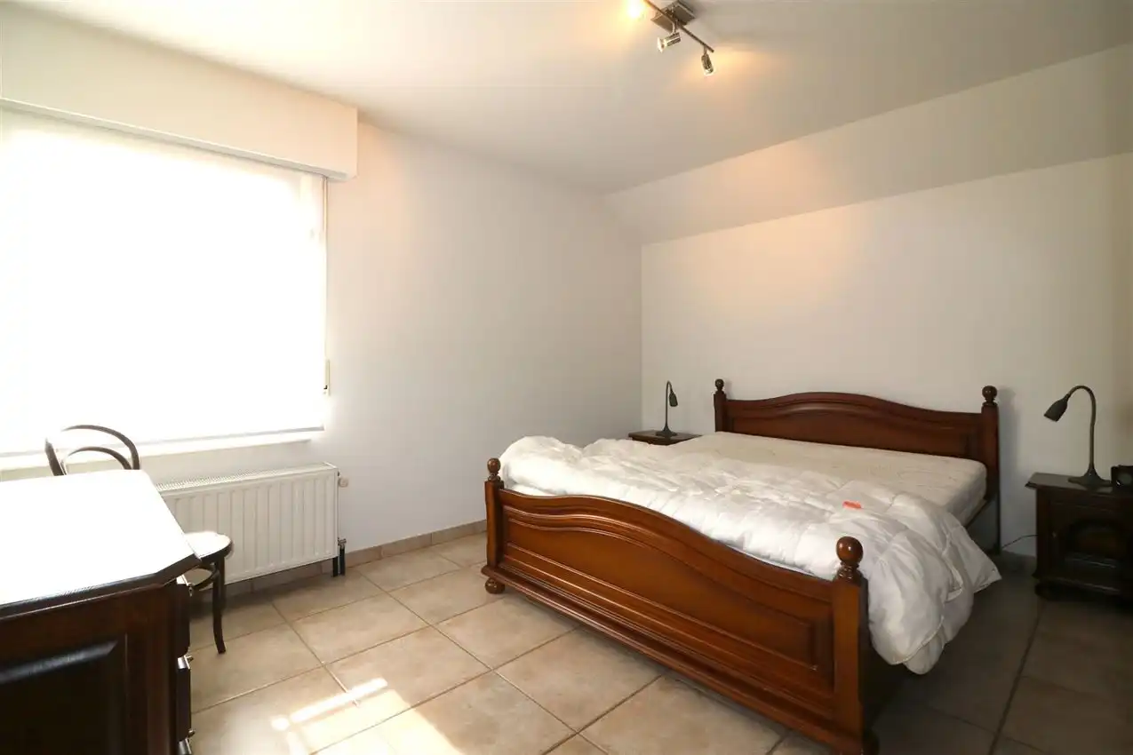 Gusting gelegen woning met 3 slp, garage en tuin foto 15