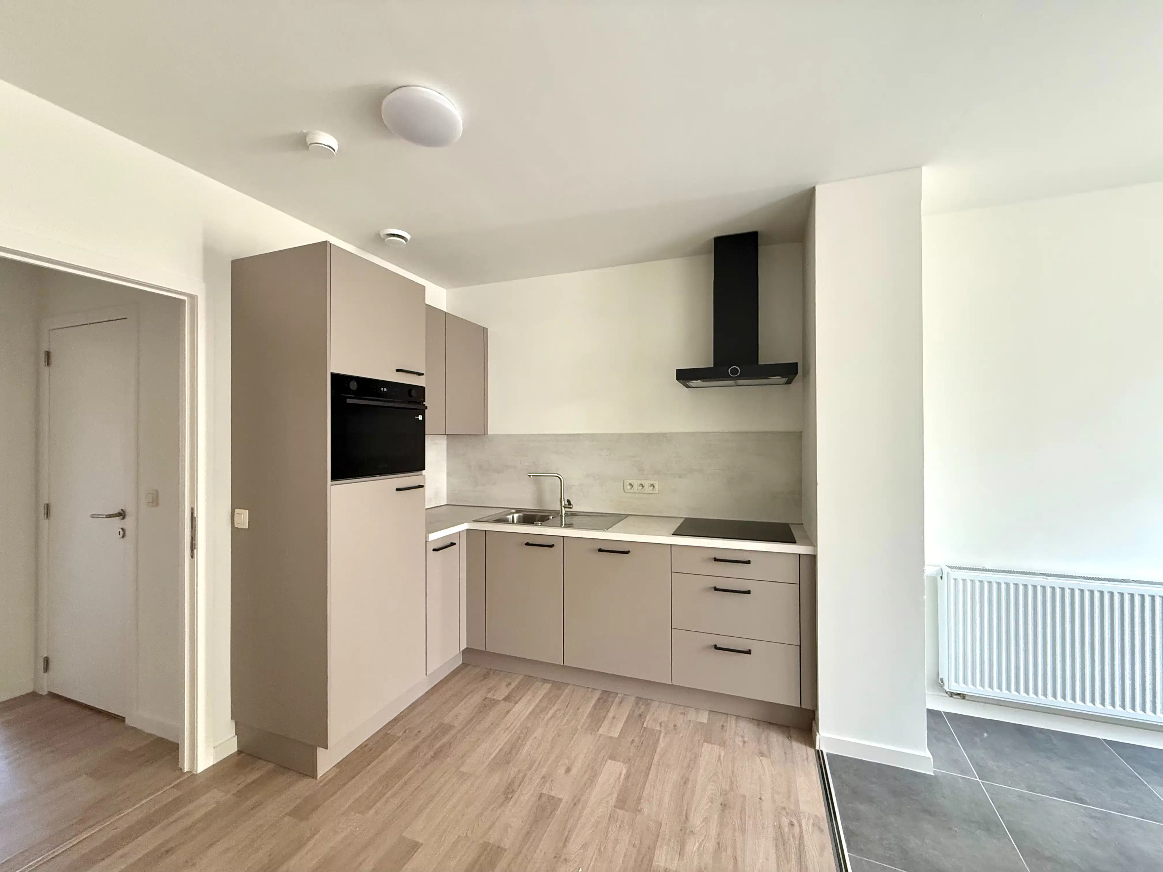 Ruim appartement met 4 slaapkamers en uitzonderlijk privatieve tuin foto 2