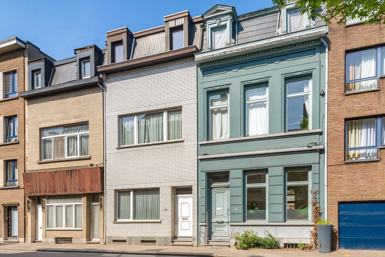 Ruime gezinswoning met 5 à 6 slaapkamers en ruime tuin te Antwerpen! foto 2