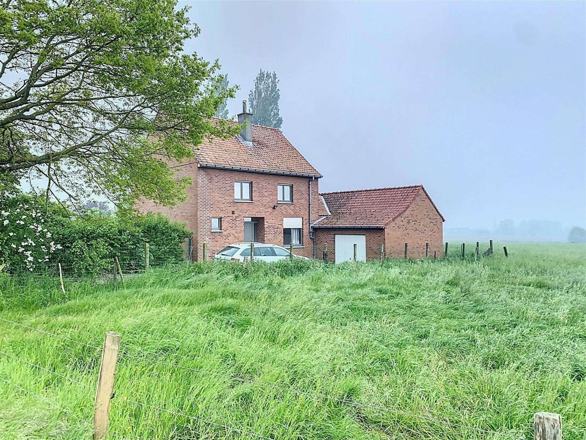 Rustig gelegen vrijstaande woning met 7310m² grond gelegen in woongebied met landelijk karakter foto 16