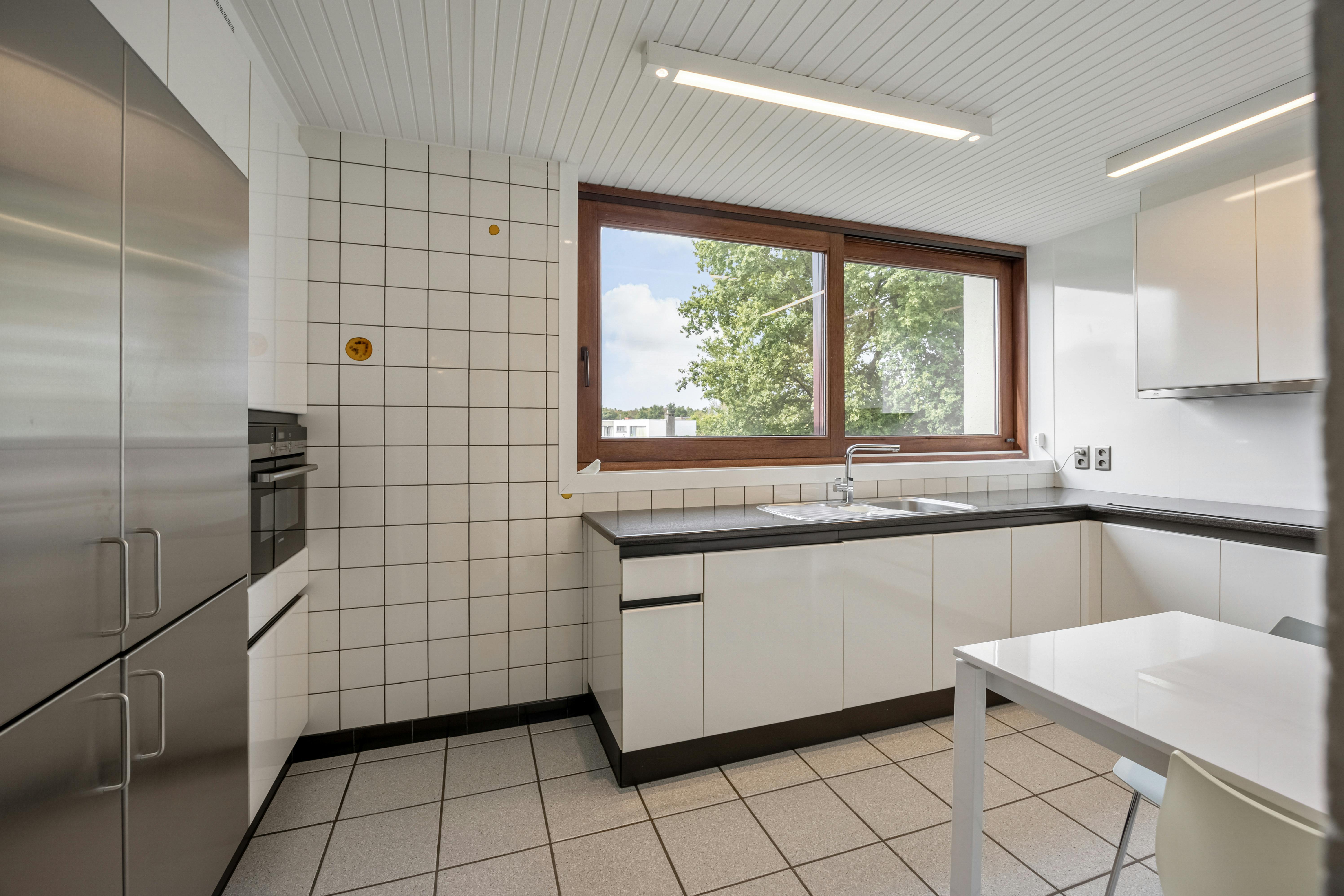 Uitzonderlijke villa met praktijk op toplocatie in Hasselt foto 16