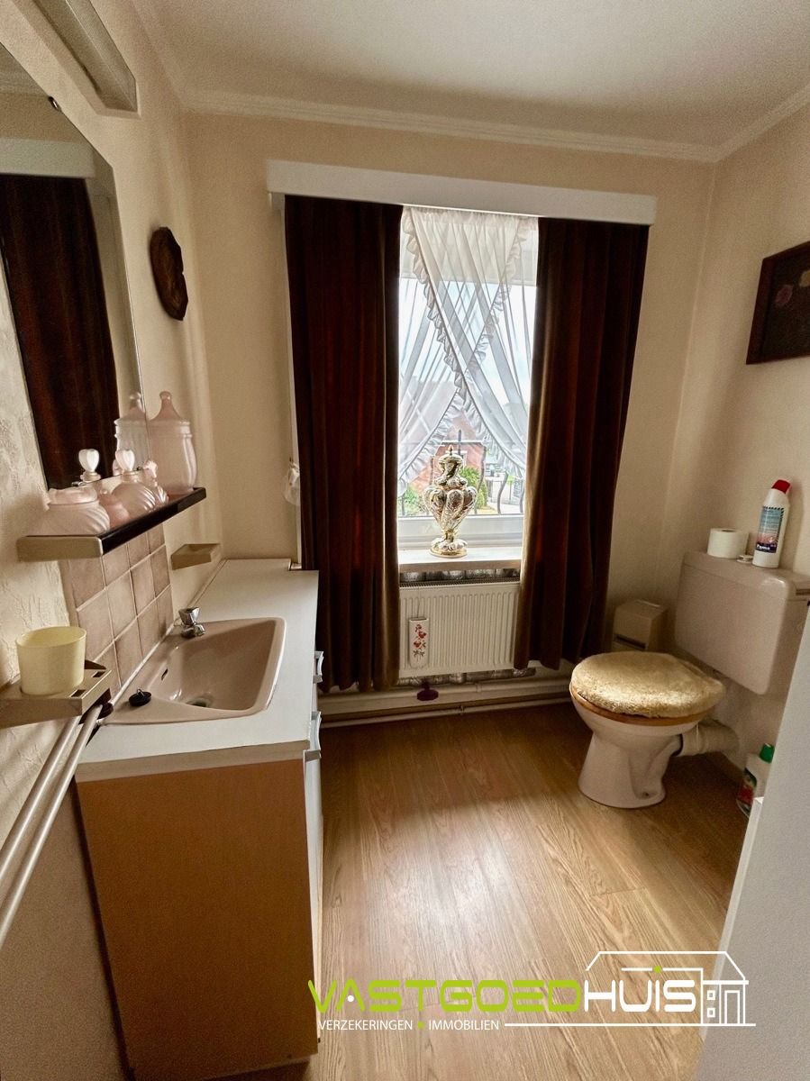 Ruime gezinswoning met garage en tuin foto 16