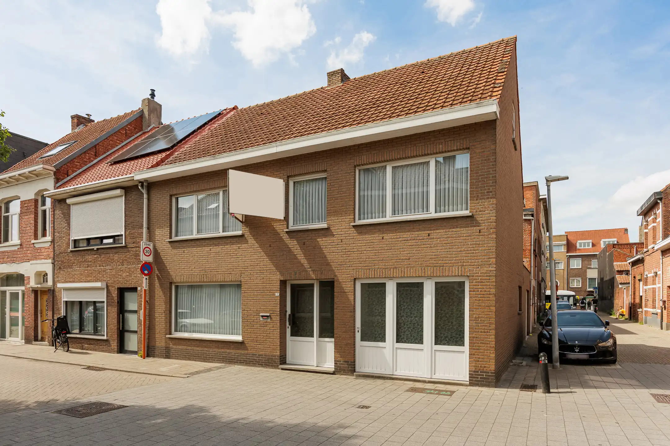 Te renoveren 3slpk-woning met 2 garages & tuin nabij centrum foto 28
