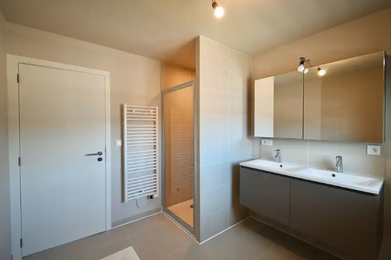 Moderne passiefwoning met 3 slaapkamers, garage en tuin op toplocatie in Deinze (EPC A) foto 10