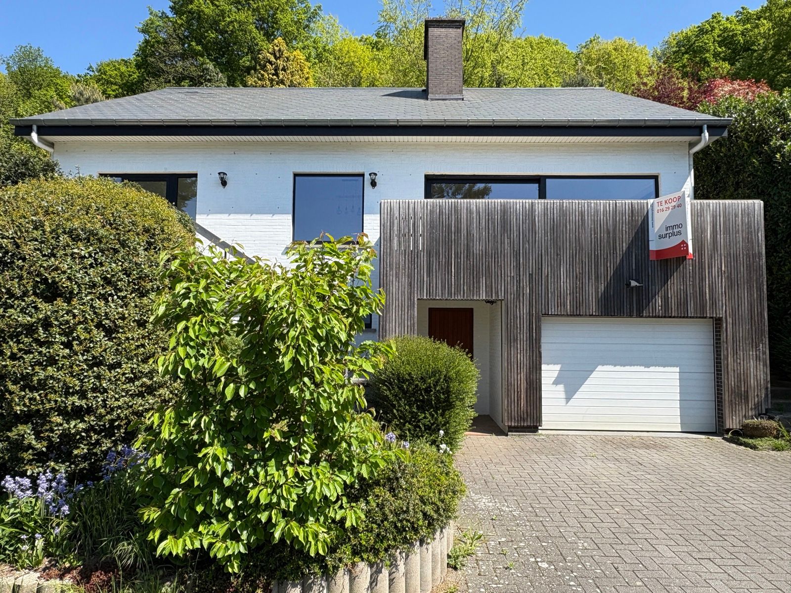 Ruime gezinswoning - rustig wonen in het groen. foto {{pictureIndex}}