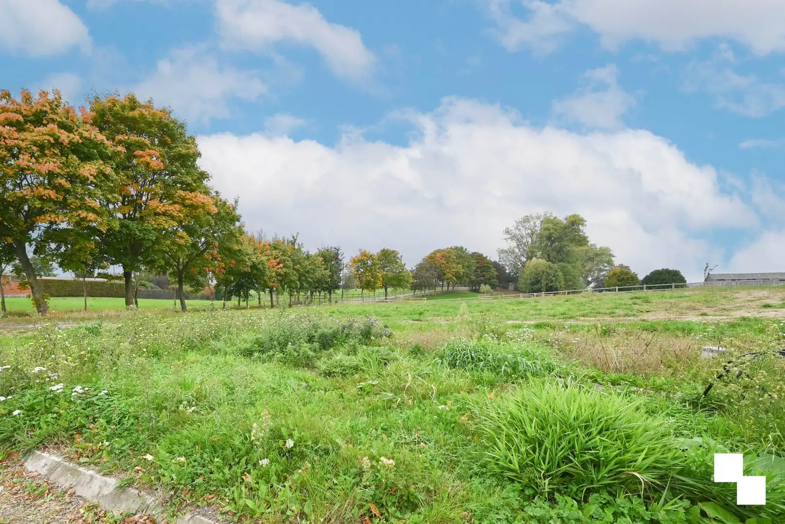 Bouwgrond met landelijk verzicht in De Ginste foto 4