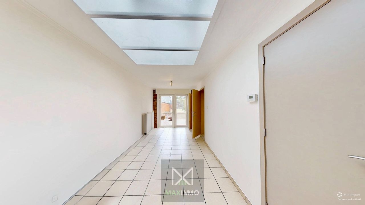 Instapklare, lichtrijke gezinswoning met grote tuin te Menen foto 7