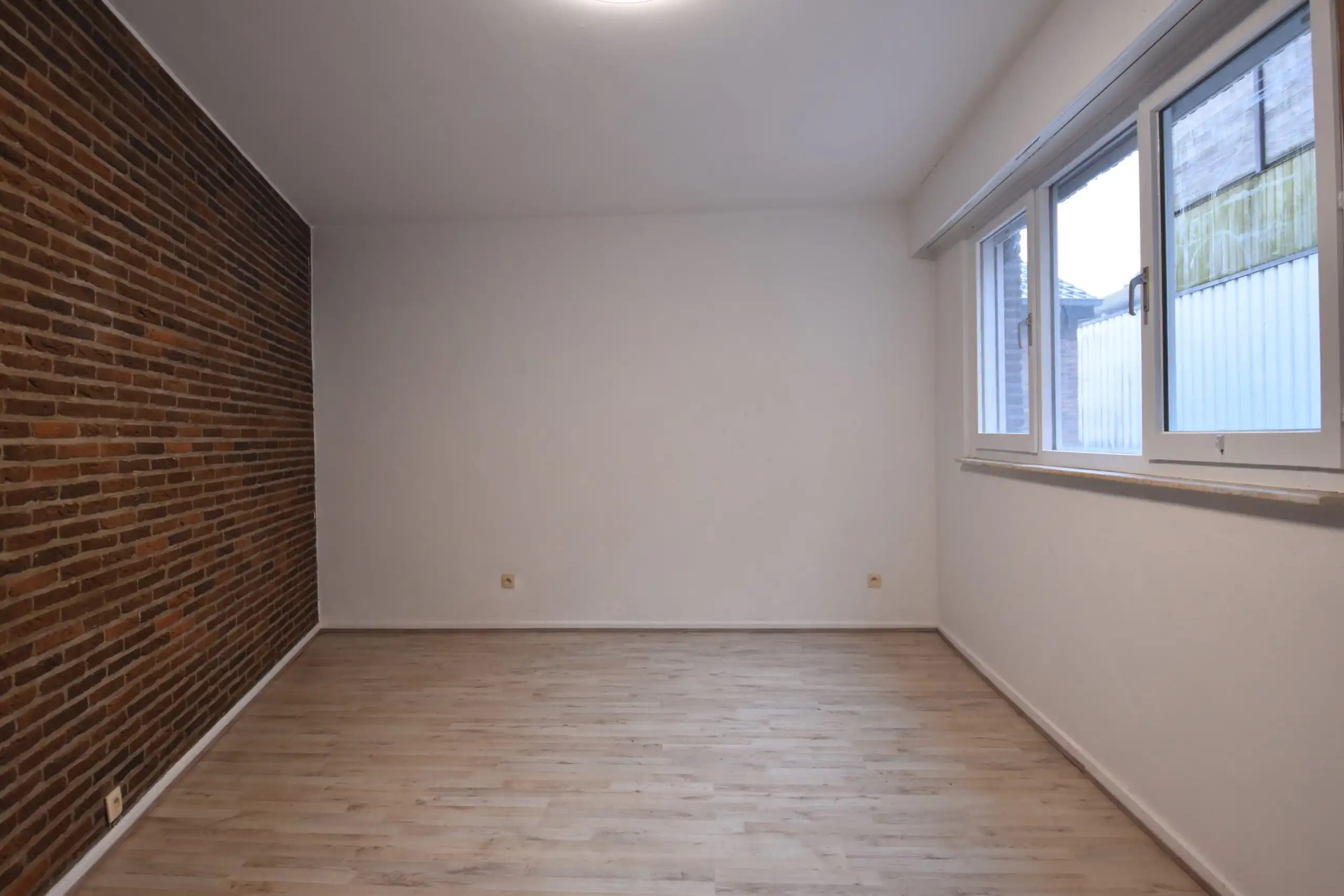 Instapklaar gelijkvloers appartement te huur in hartje Nieuwkerken foto 6