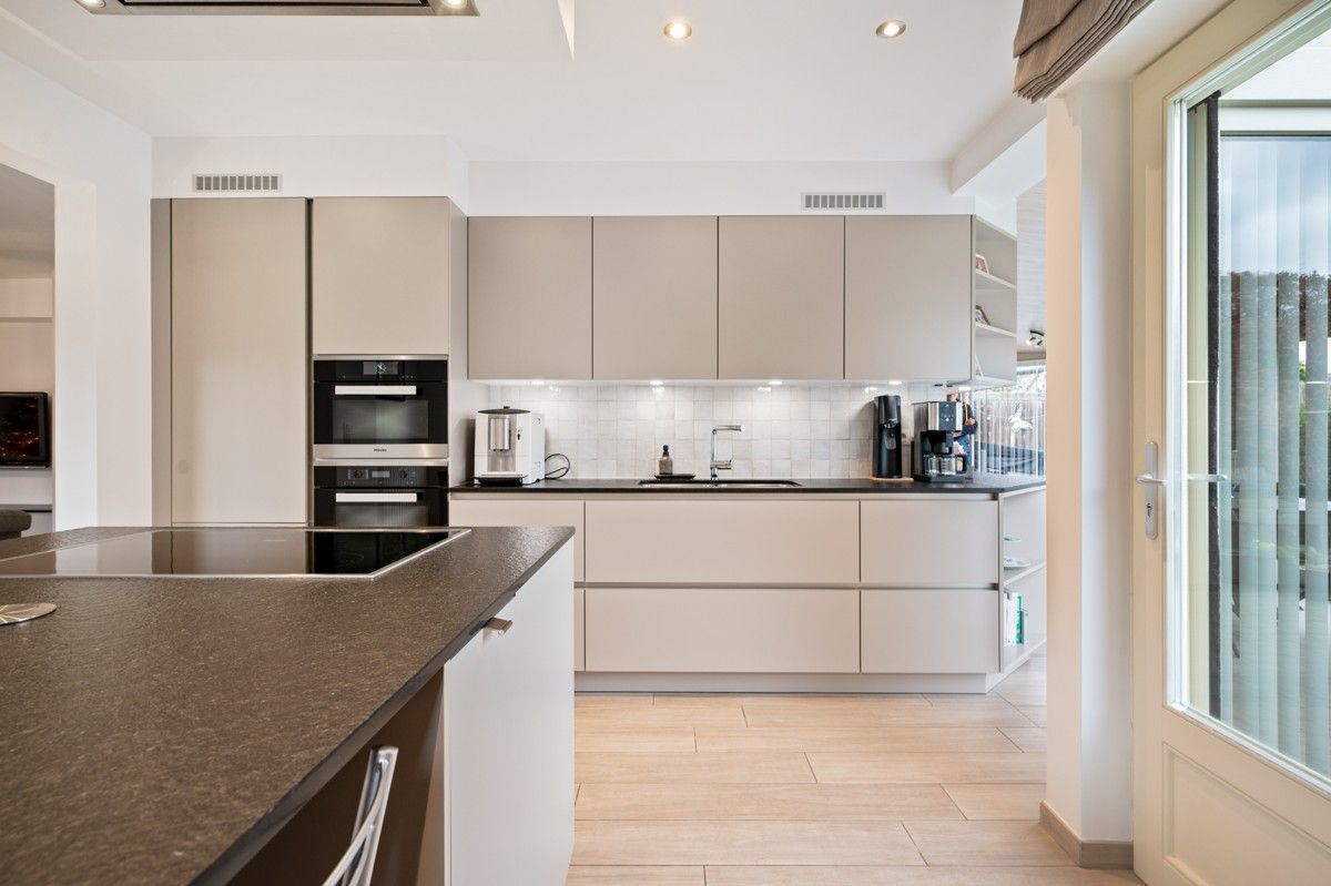 Thuiskomen in alle rust - charmante woning met 4 slaapkamer op 645 m² in doodlopende straat. foto 10