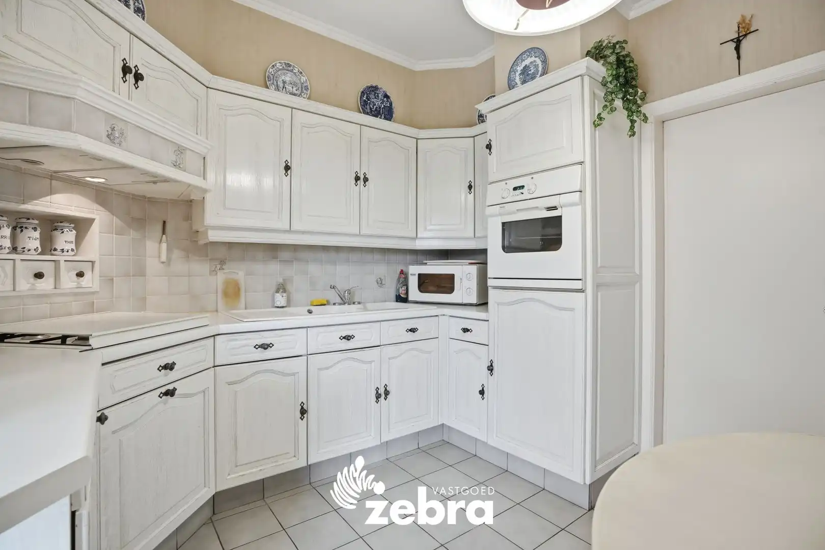 Te renoveren woning op ruim perceel in Eernegem! foto 11