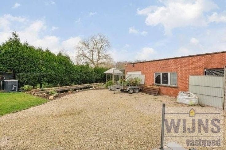 Veelzijdig renovatieproject met enorm potentieel op gunstige ligging foto 5
