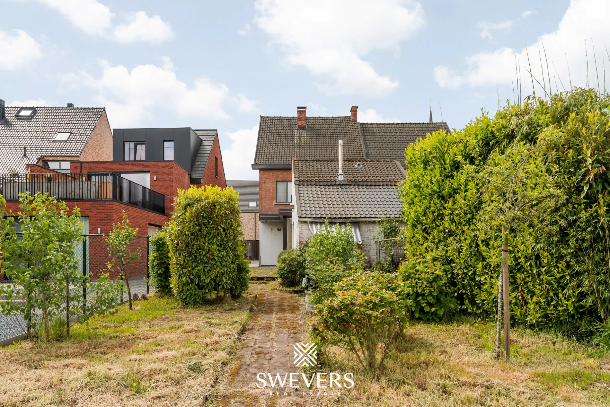Statige woning met veel potentieel in het centrum van Diepenbeek foto 23