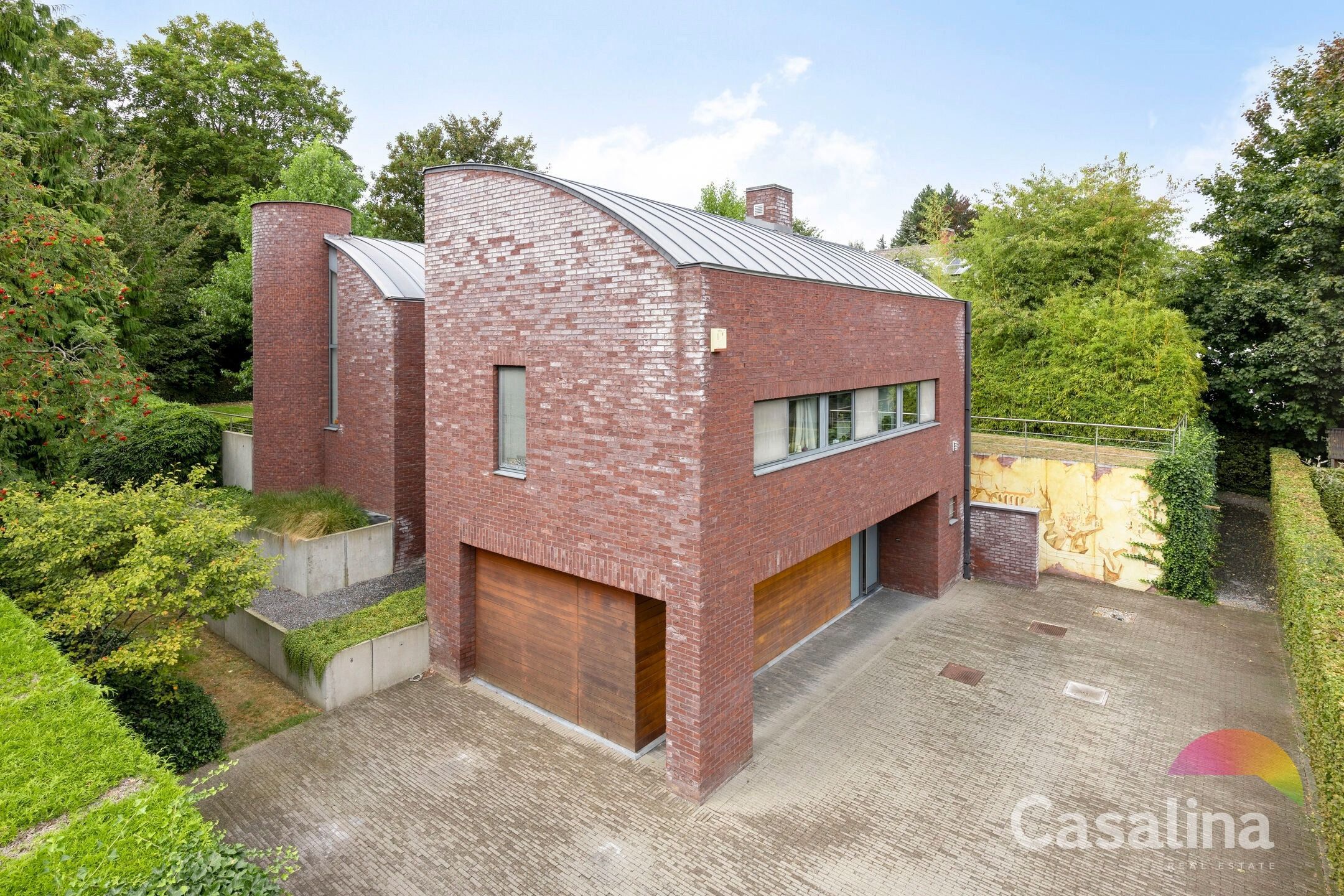 Uitstekend villa met vrijwel onzichtbare tuin  Park Tervuren foto {{pictureIndex}}