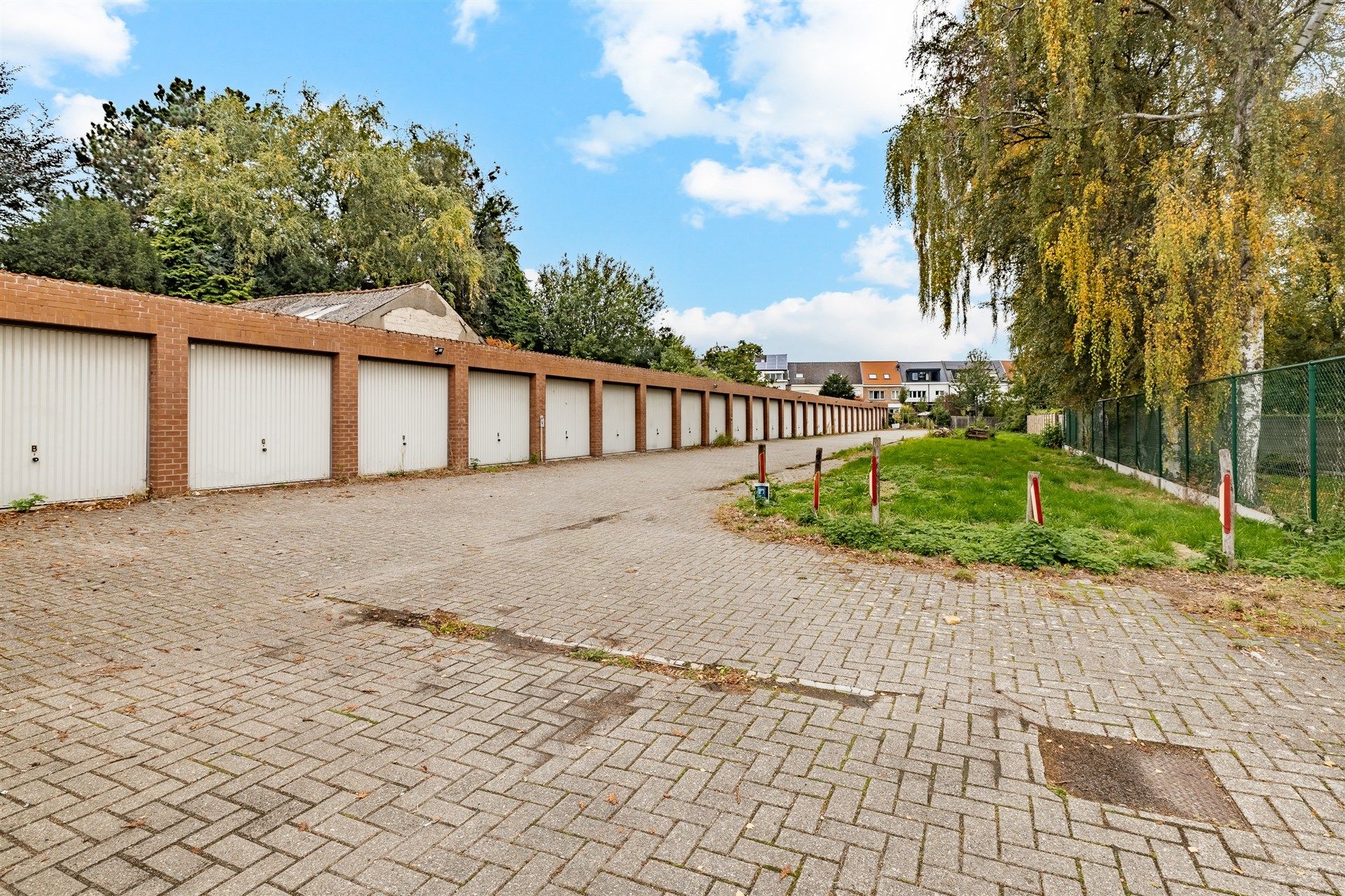 Opbrengsteigendom bestaande uit 6 ruime appartementen + 32 garageboxen foto 32
