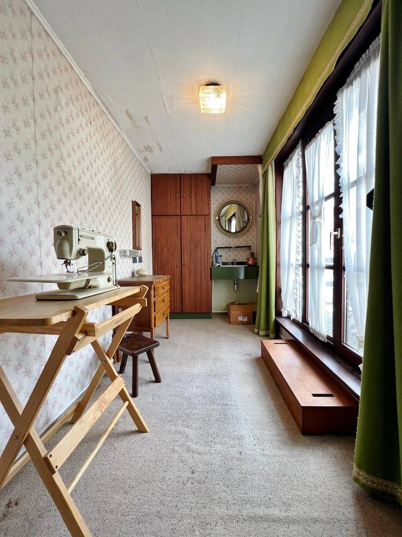 Twee te renoveren woningen met tuintje in de stadskern van Ieper foto 14