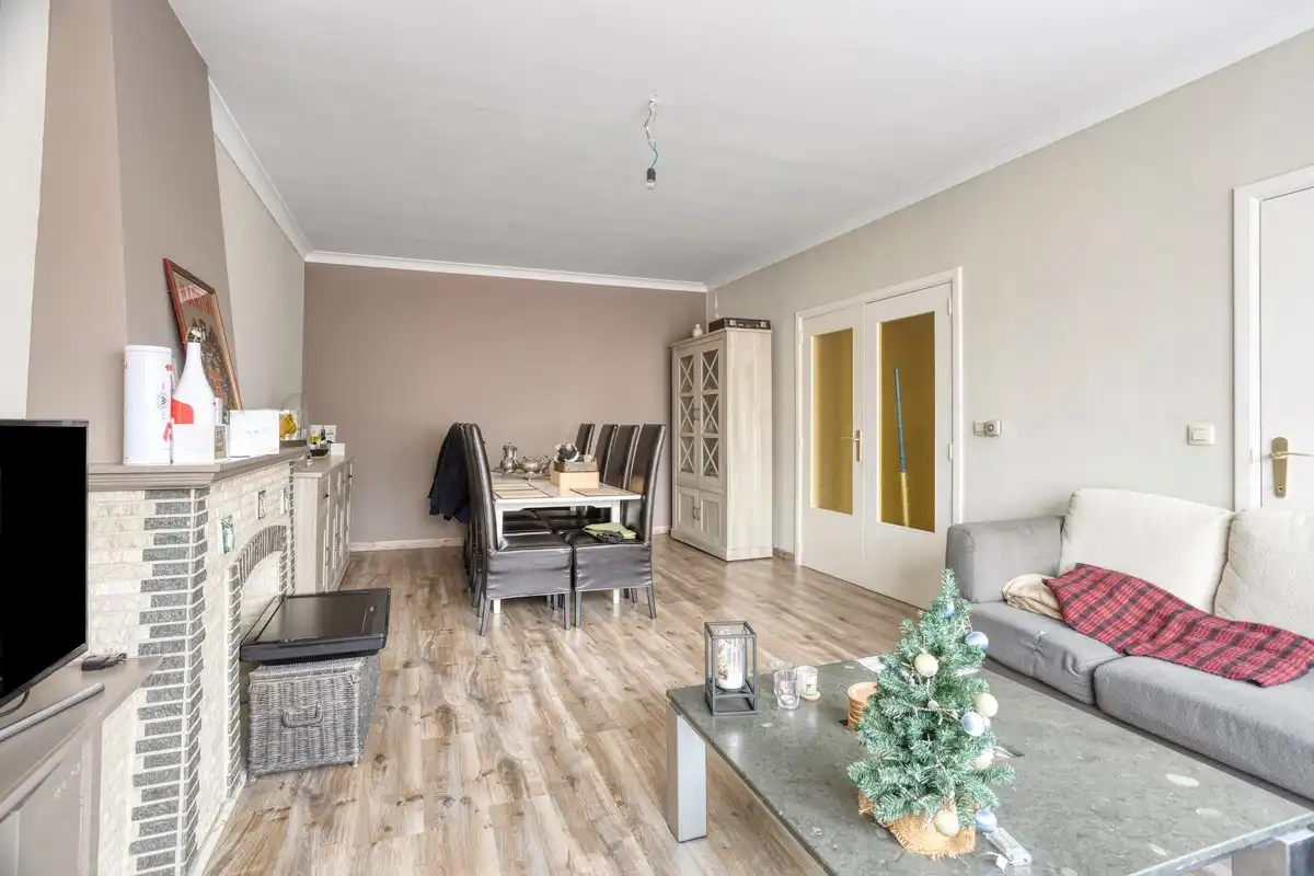 Opbrengsteigendom met 3 appartementen, garages en tuin foto 14