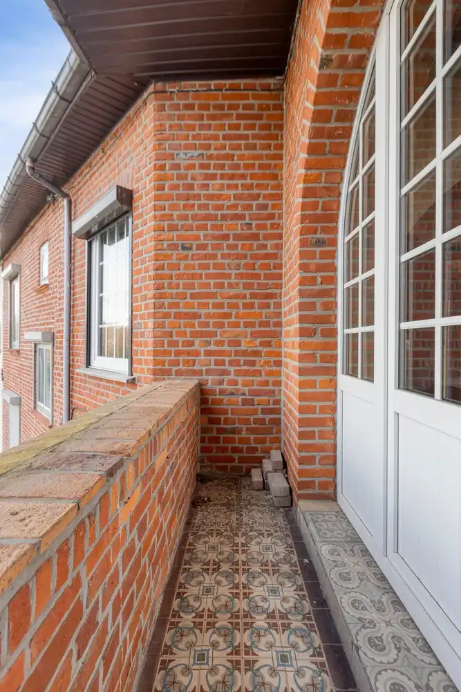 Te renoveren rijwoning met veel potentieel in hartje Genk foto 22