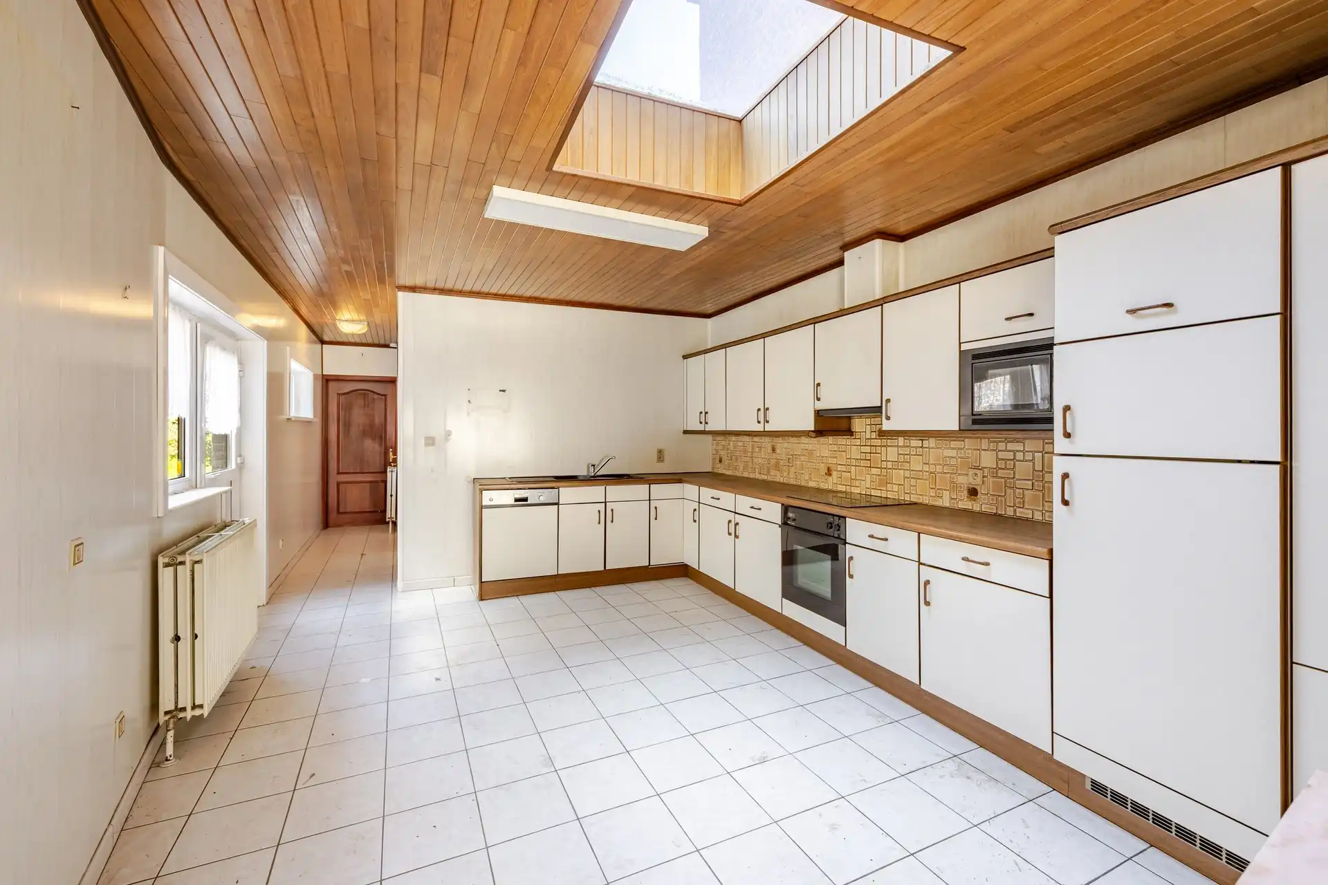 Halfopen bebouwing met enorm potentieel op een perceel van maar liefst 1.050 m² foto 5
