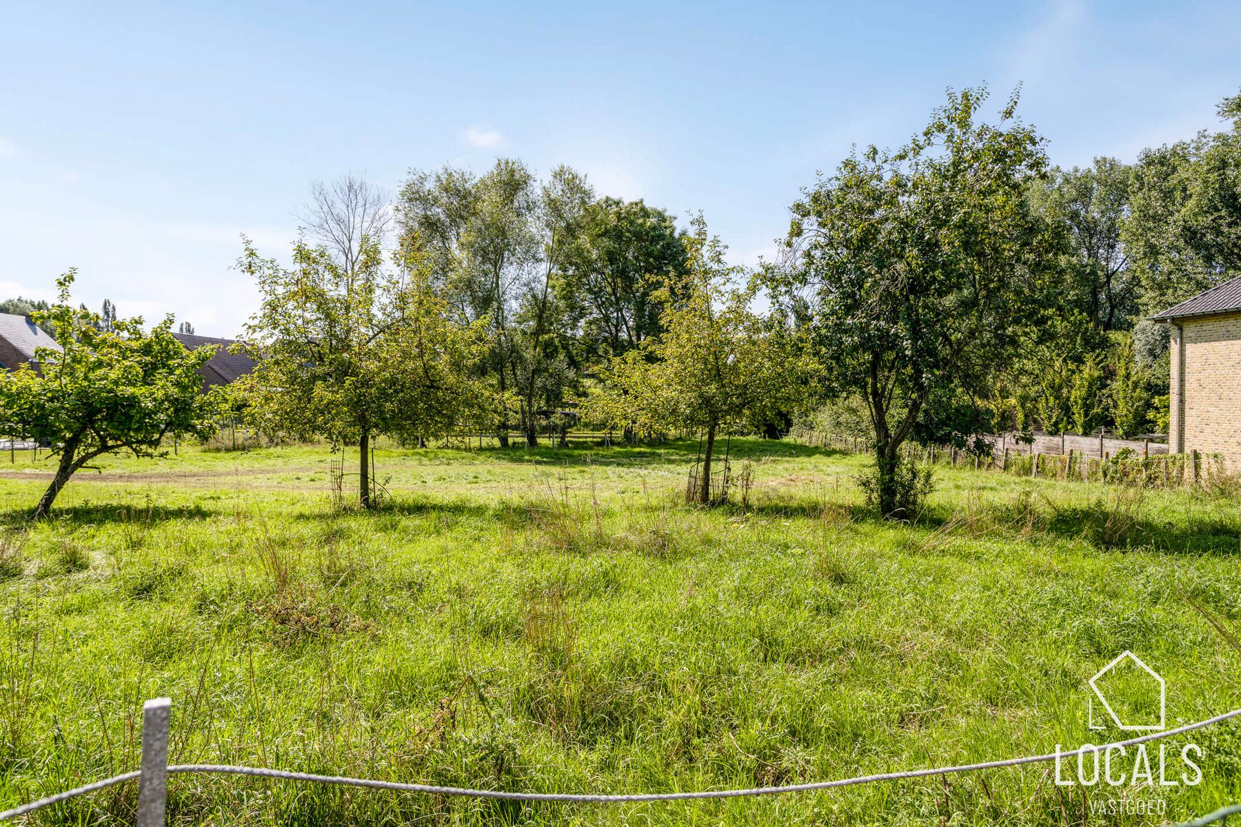 Prachtig gelegen, zuidgerichte bouwgrond met vergunning! foto 3