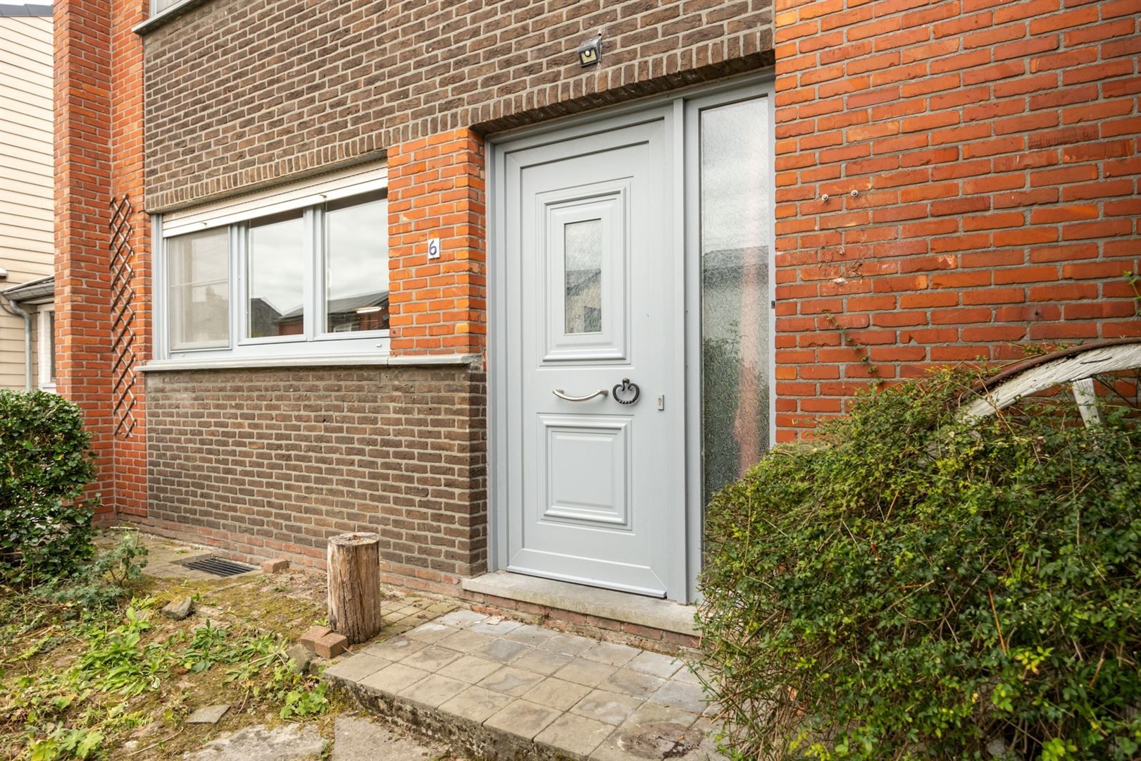 Halfopen woning met potentieel foto 23