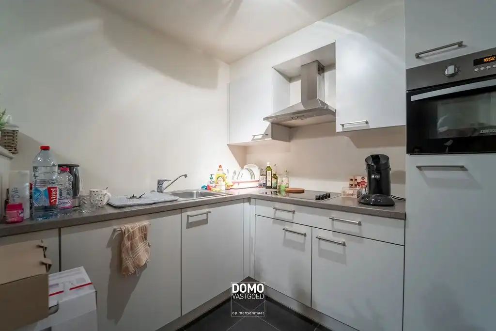 MODERN EN ENERGIEZUINING APPARTEMENT MET 1 SLAAPKAMER EN EIGEN PARKING TE BILZEN foto 4