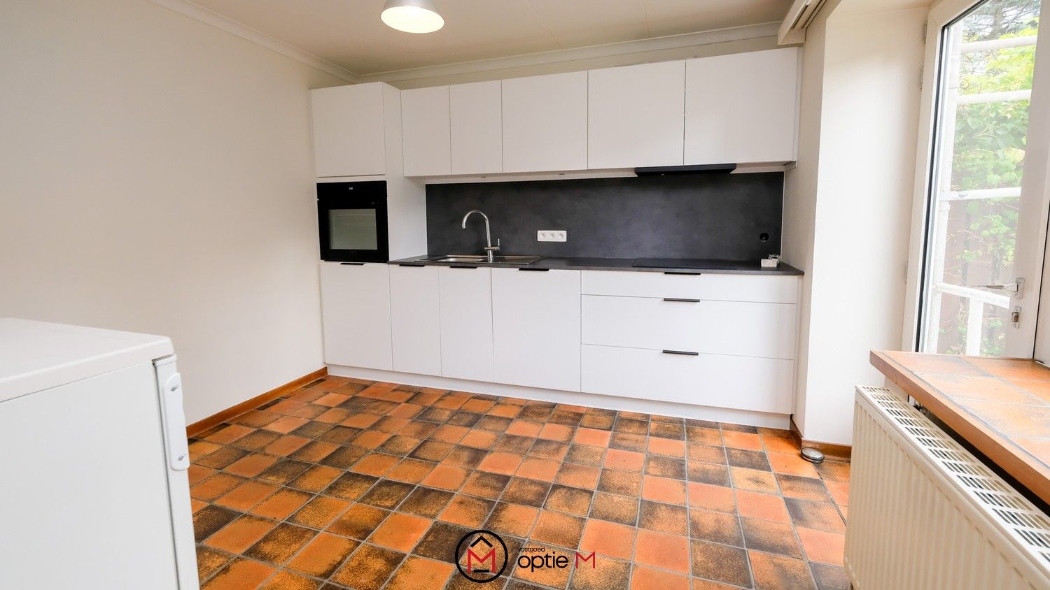 Halfopen woning te huur met tuin en garage in Bilzen foto 5