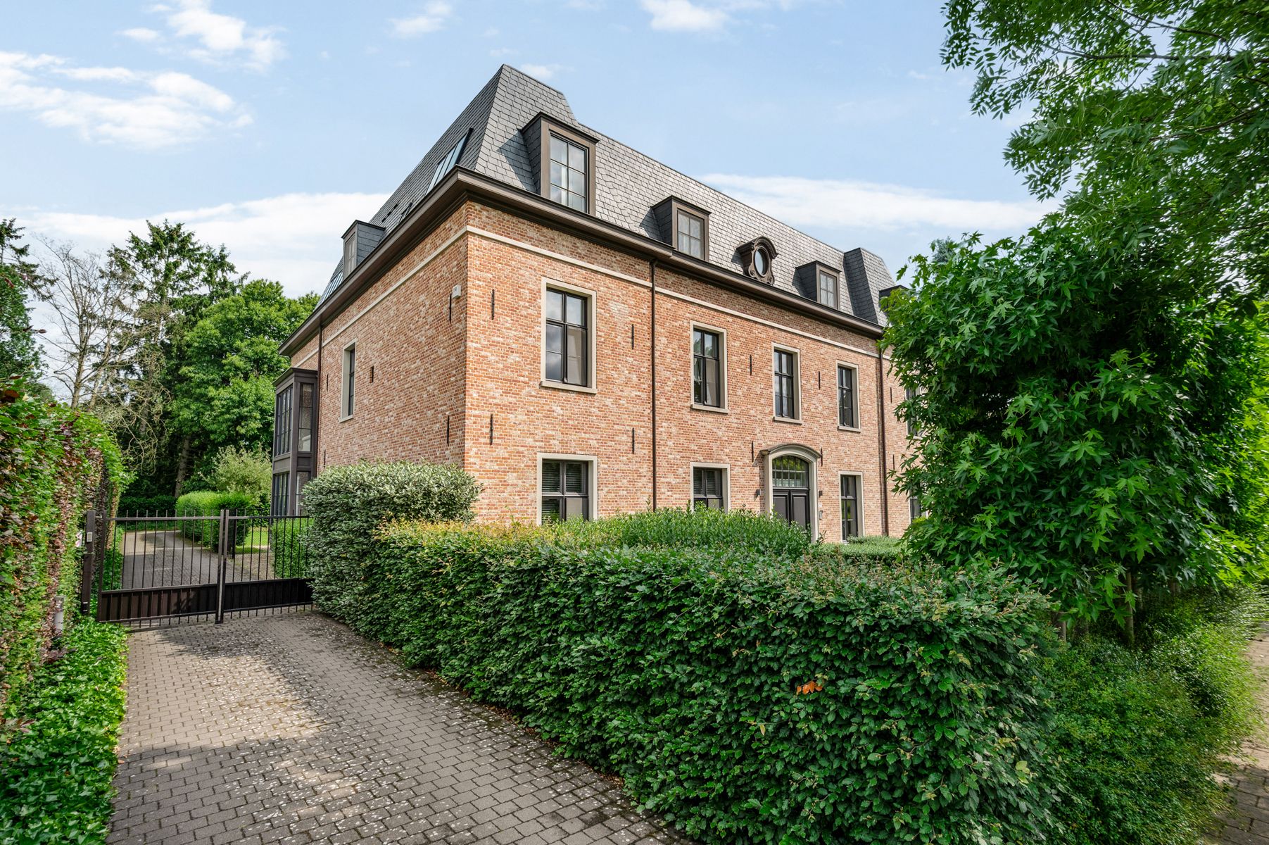 Luxe gelijkvloersapp. met ondergrondse parking en tuin. foto 34