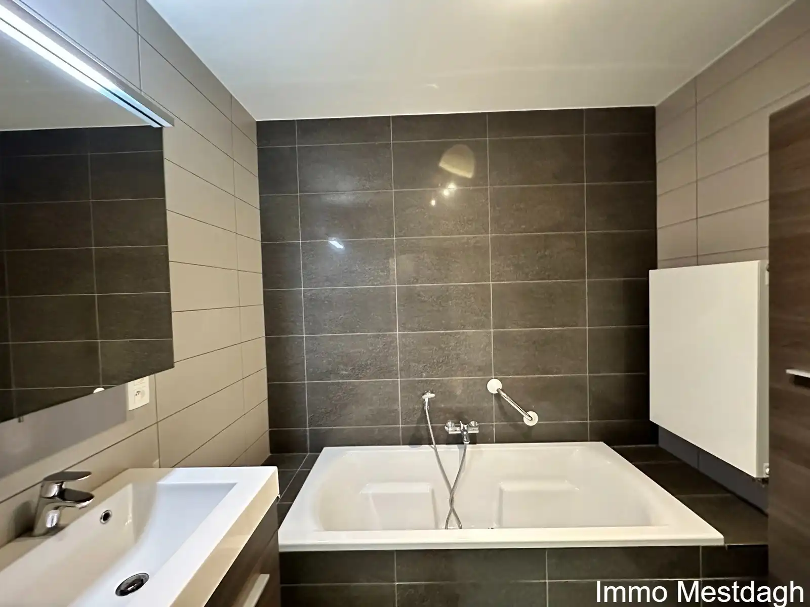 Ruim gelijkvloers appartement met tuin en autostaanplaats. foto 20