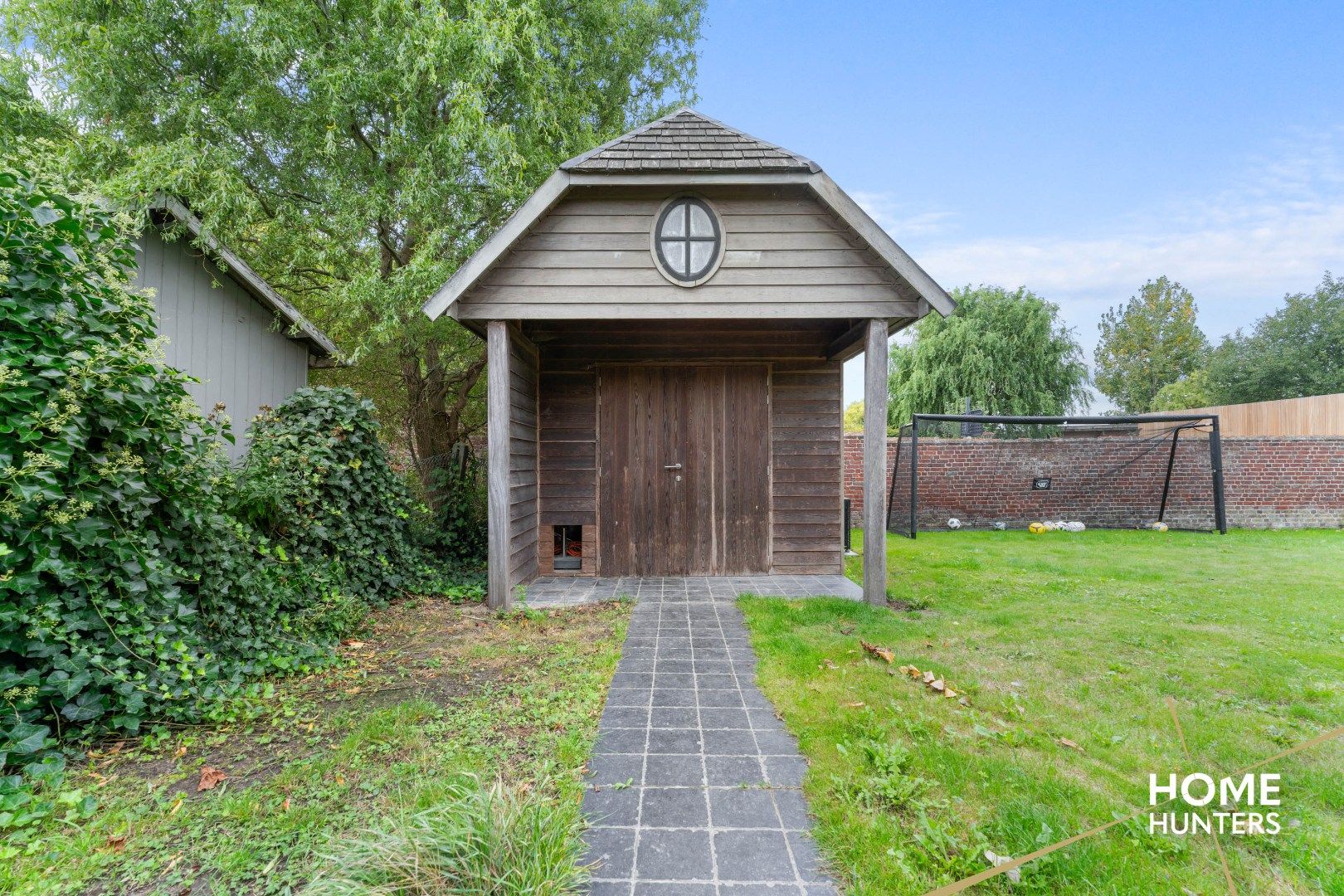 Ruime woning met 4 slaapkamers, een ruime zonnige tuin met verwarmd zwembad foto 9