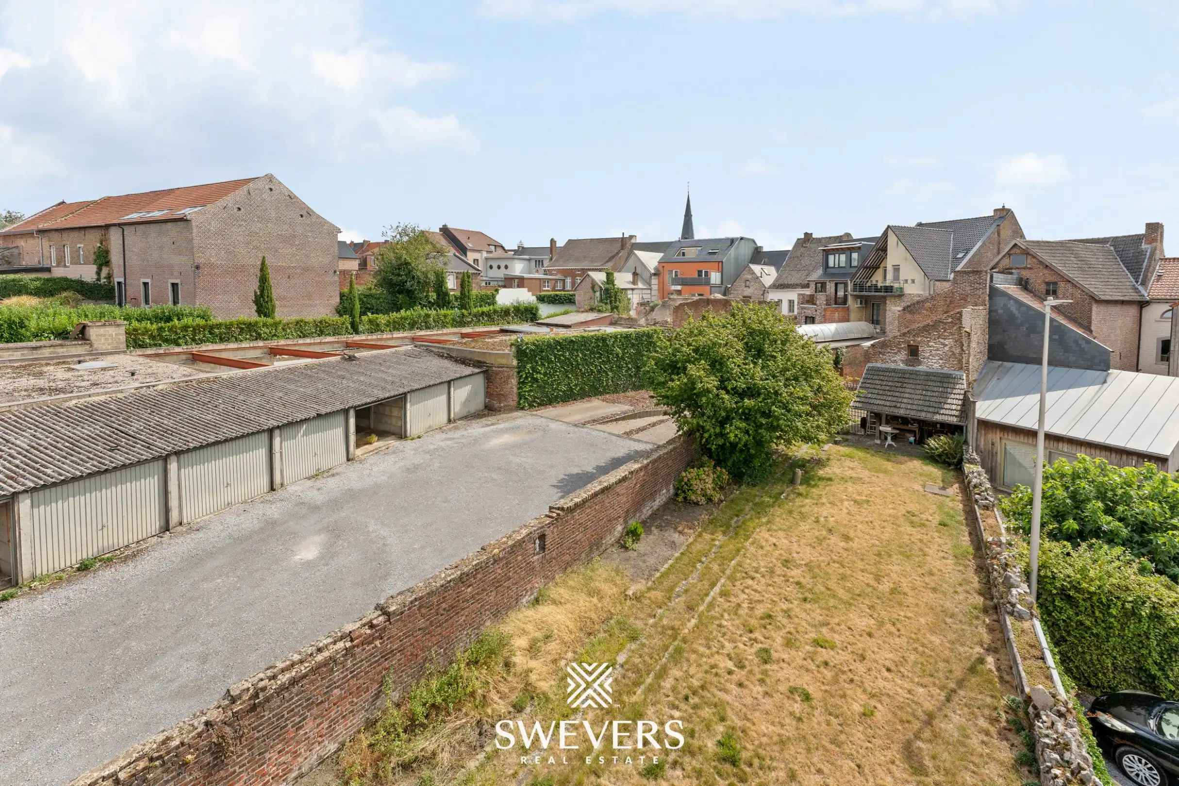 Karaktervol herenhuis met 346 m² woonruimte en uitzonderlijk renovatiepotentieel in centrum Borgloon foto 45