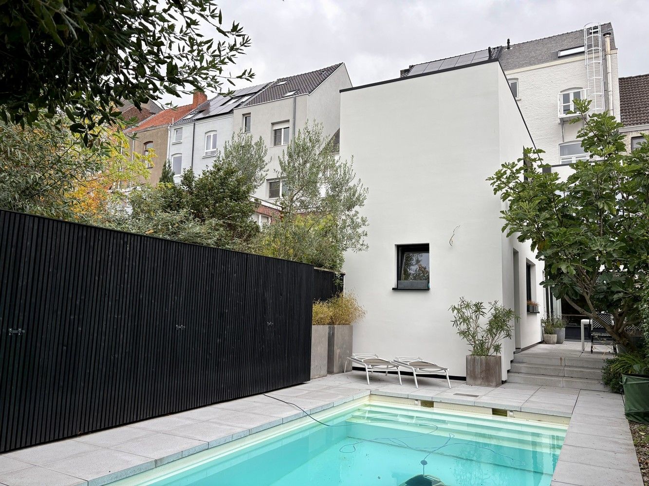 Buitengewoon royaal herenhuis centrum Gent met verwarmd buitenzwembad. foto 37