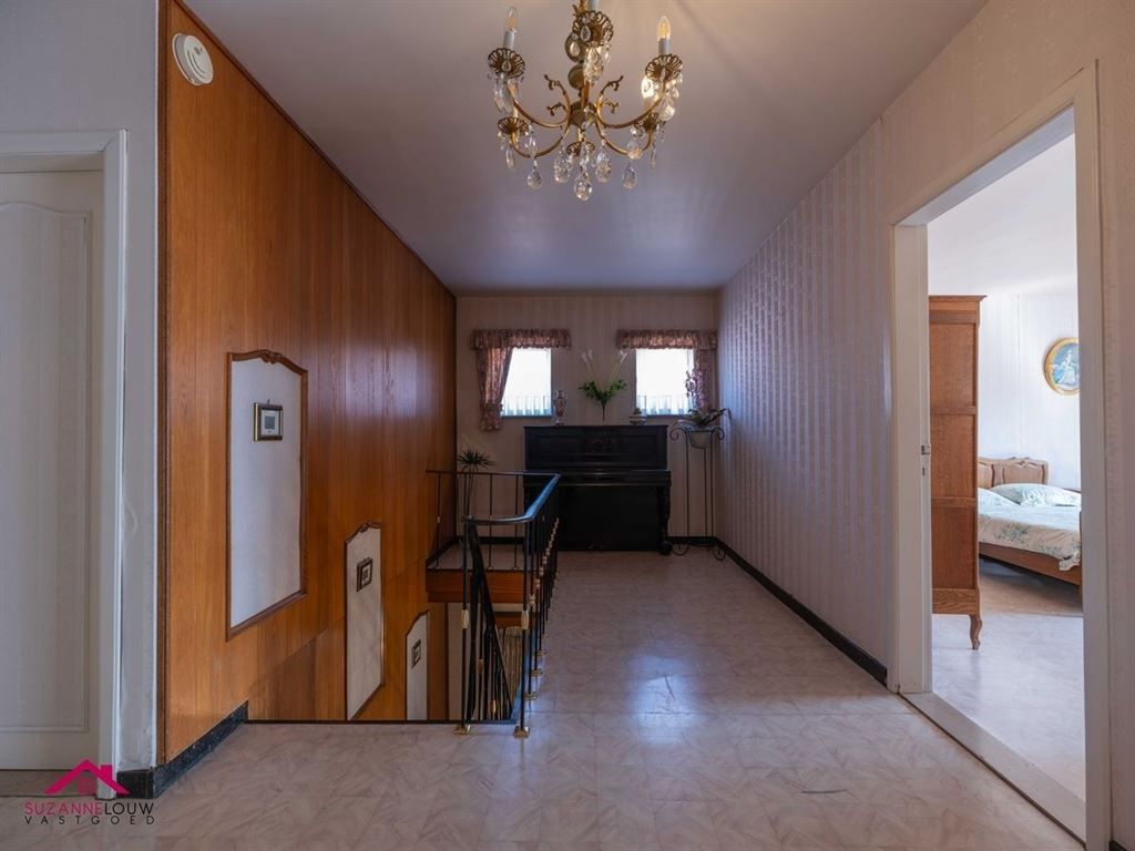 Half vrijstaande woning met garage foto 30