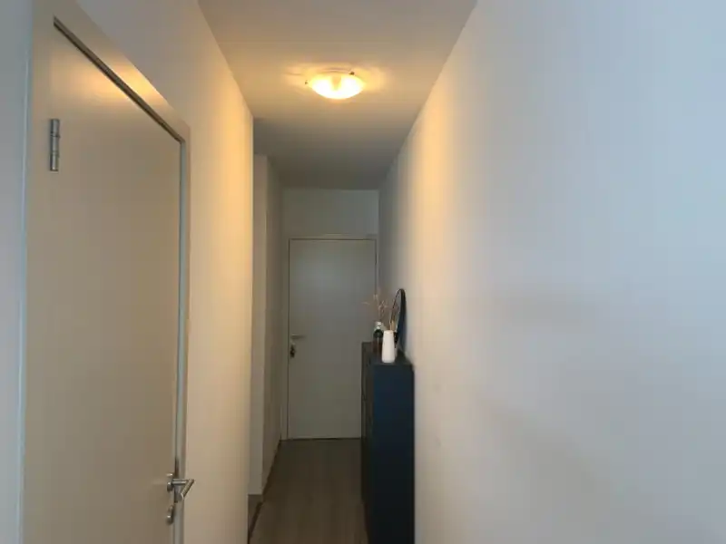 GELIJKVLOERS APPARTEMENT MET TUIN EN GARAGE foto 8