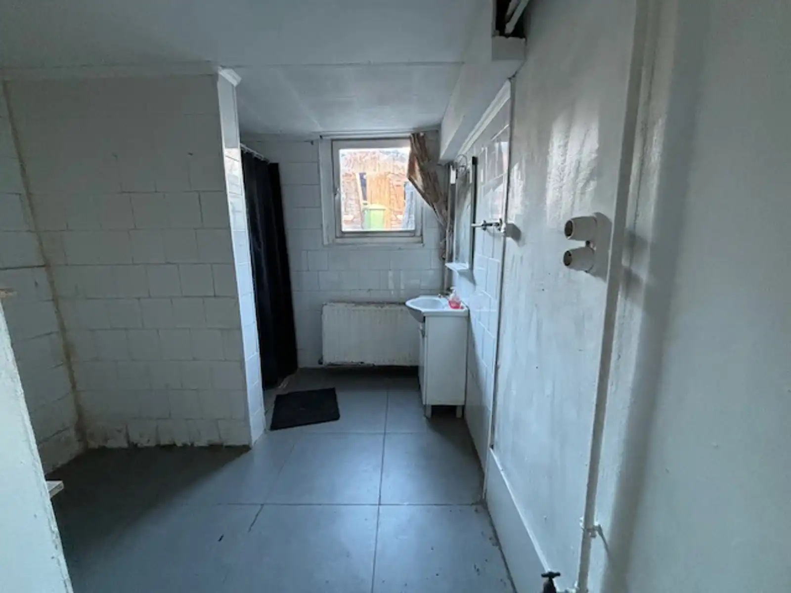 Rijwoning met zij- en achteringang te Gingelom foto 9