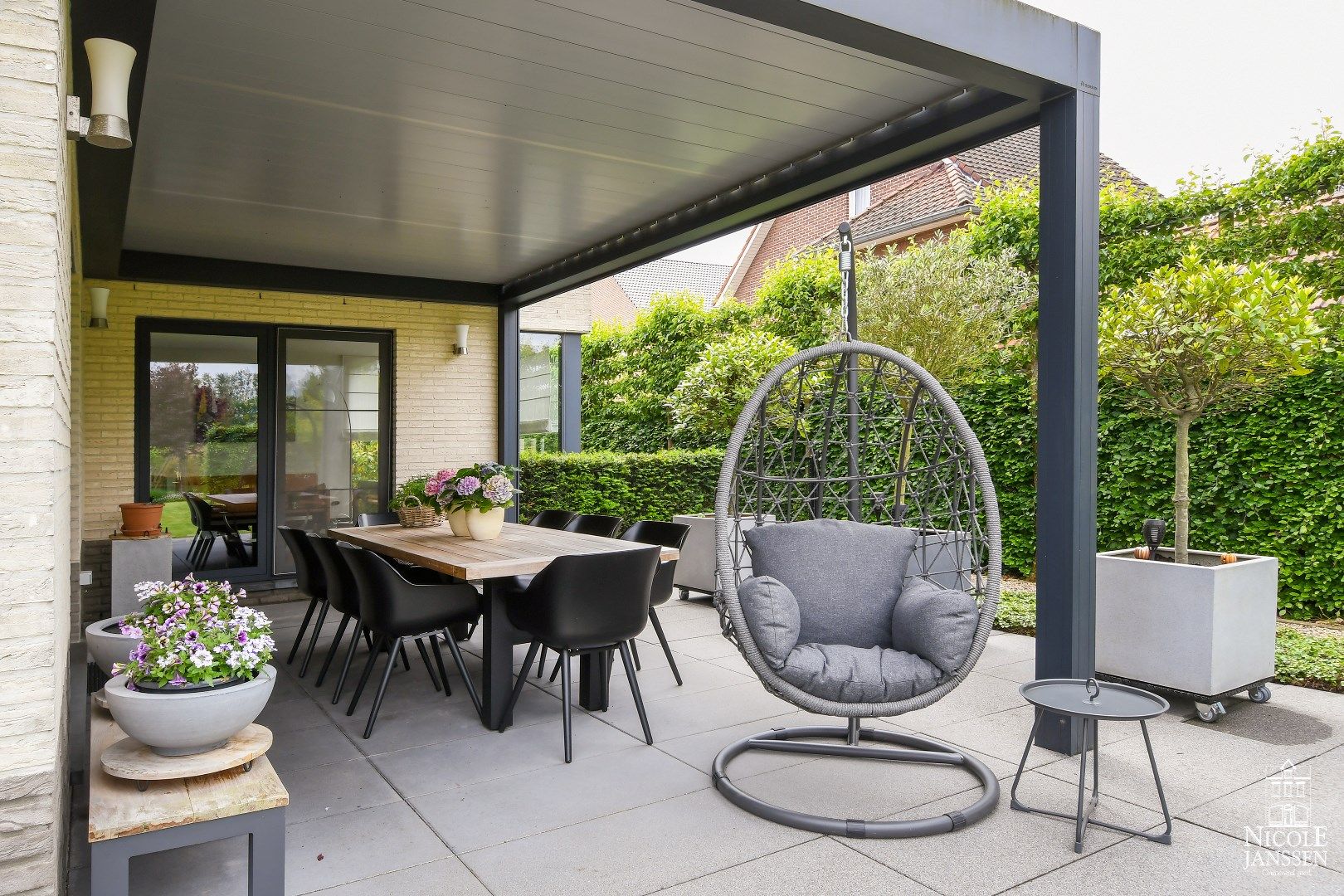 Instapklare goed onderhouden gezinswoning met mooie tuin met gezellig overdekt terras foto 10
