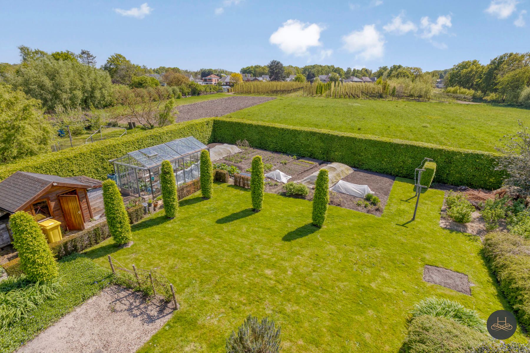 Vrijstaande woning met prachtig aangelegde zuidgerichte tuin foto 27