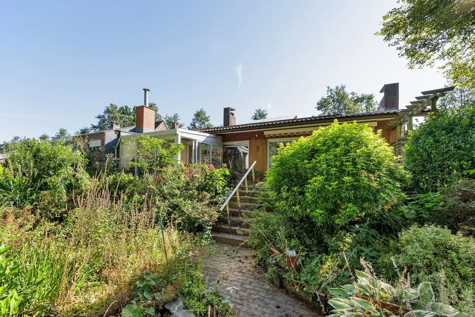 Vrijstaande woning met zuidwestgerichte tuin in groene woonwijk foto 24