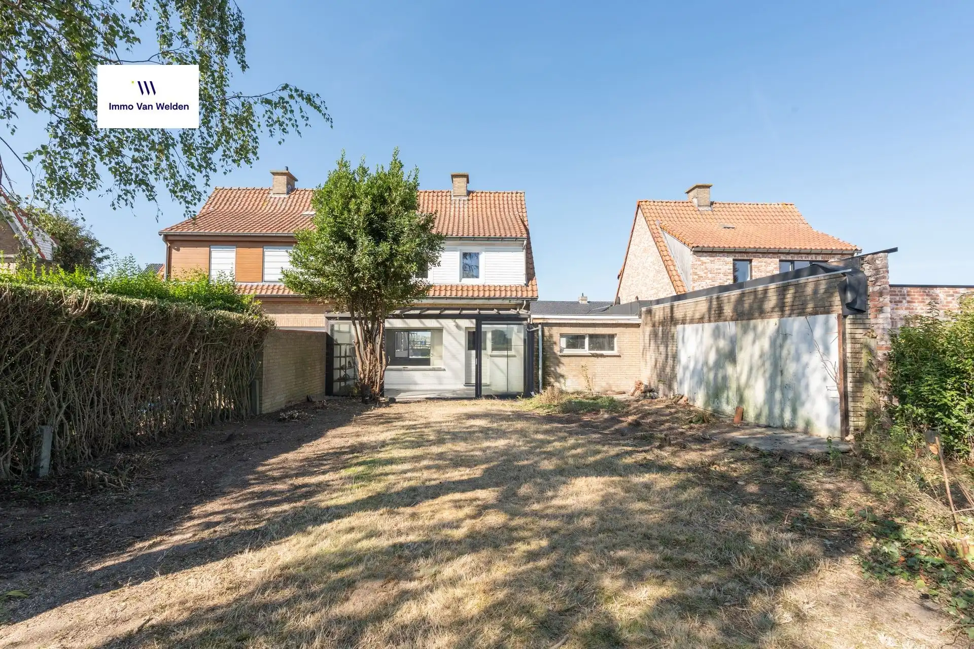 Te renoveren halfopen woning met garage en tuin in landelijke omgeving te Wortegem-Petegem. foto 14
