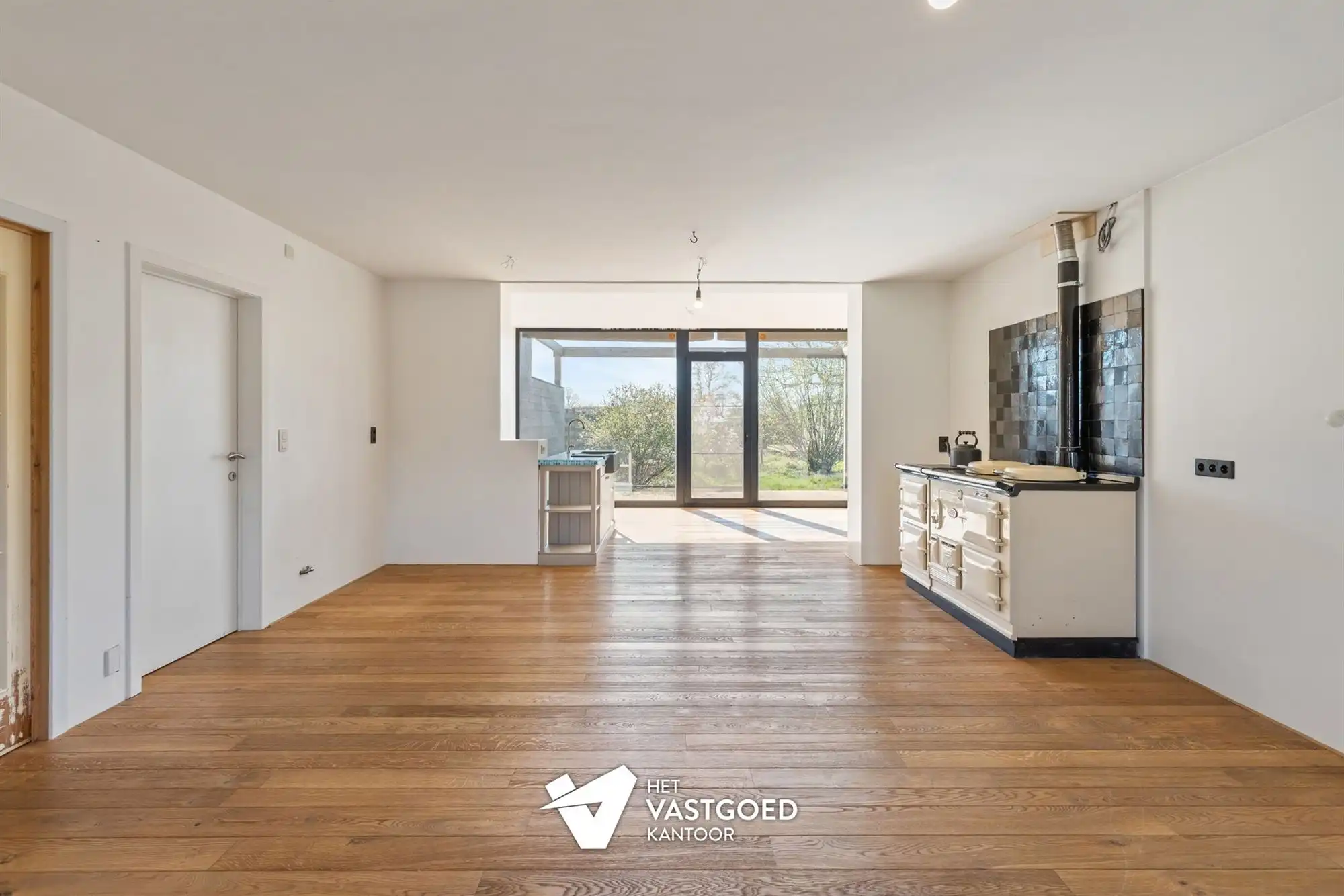 ZEER RUIME WONING MET TAL VAN MOGELIJKHEDEN OP BREED PERCEEL VAN 15 ARE TE KOERSEL foto 2