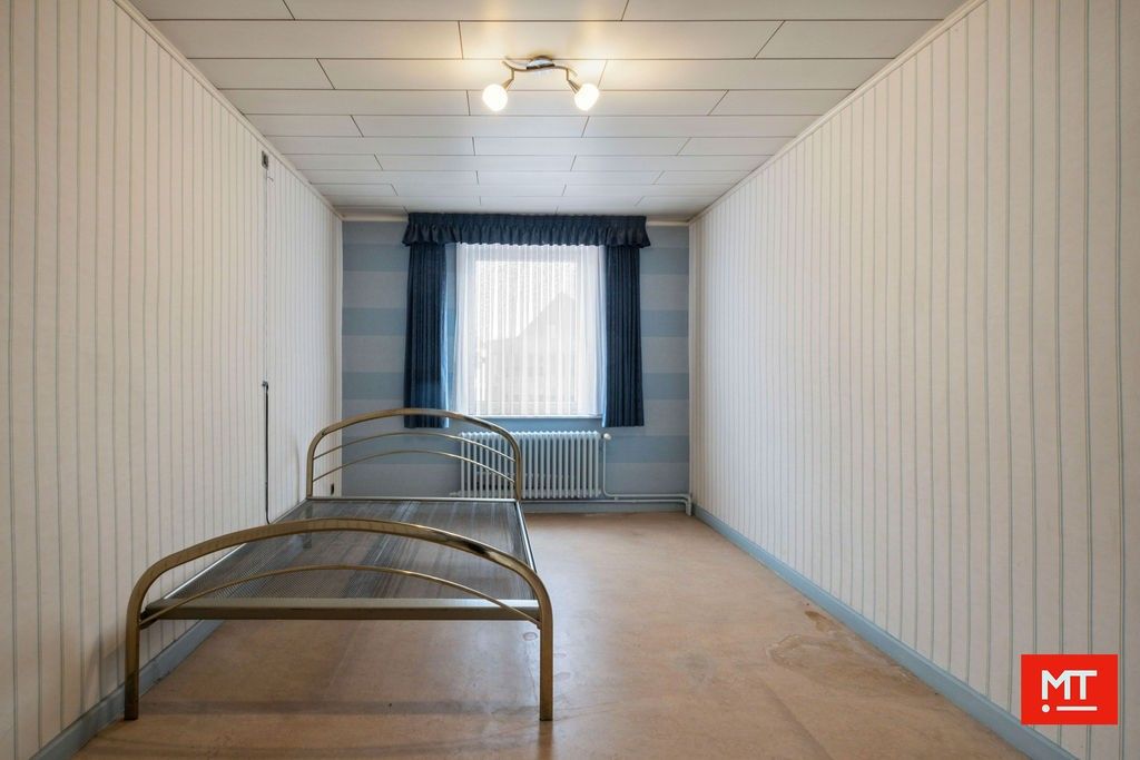Veelzijdig gebouw bestaande uit handelsruimte, woning en appartement in het centrum van Wervik foto 17
