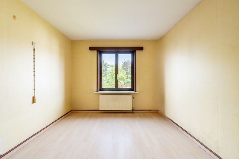 Op te knappen appartement met 3 slpks en afgesloten garage. foto 11