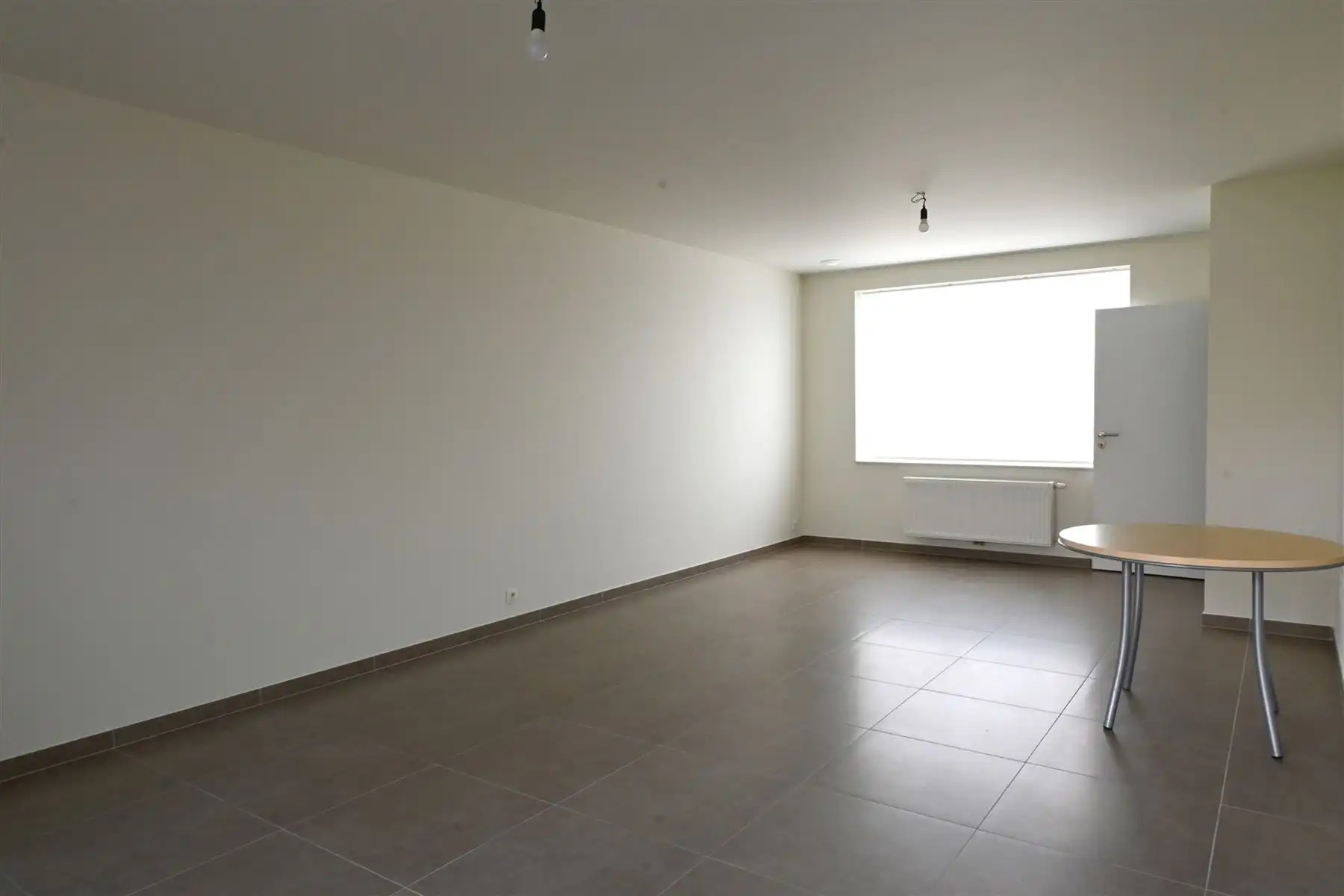 Instapklare woning met 3 slaapkamers en gezellige tuin foto 2