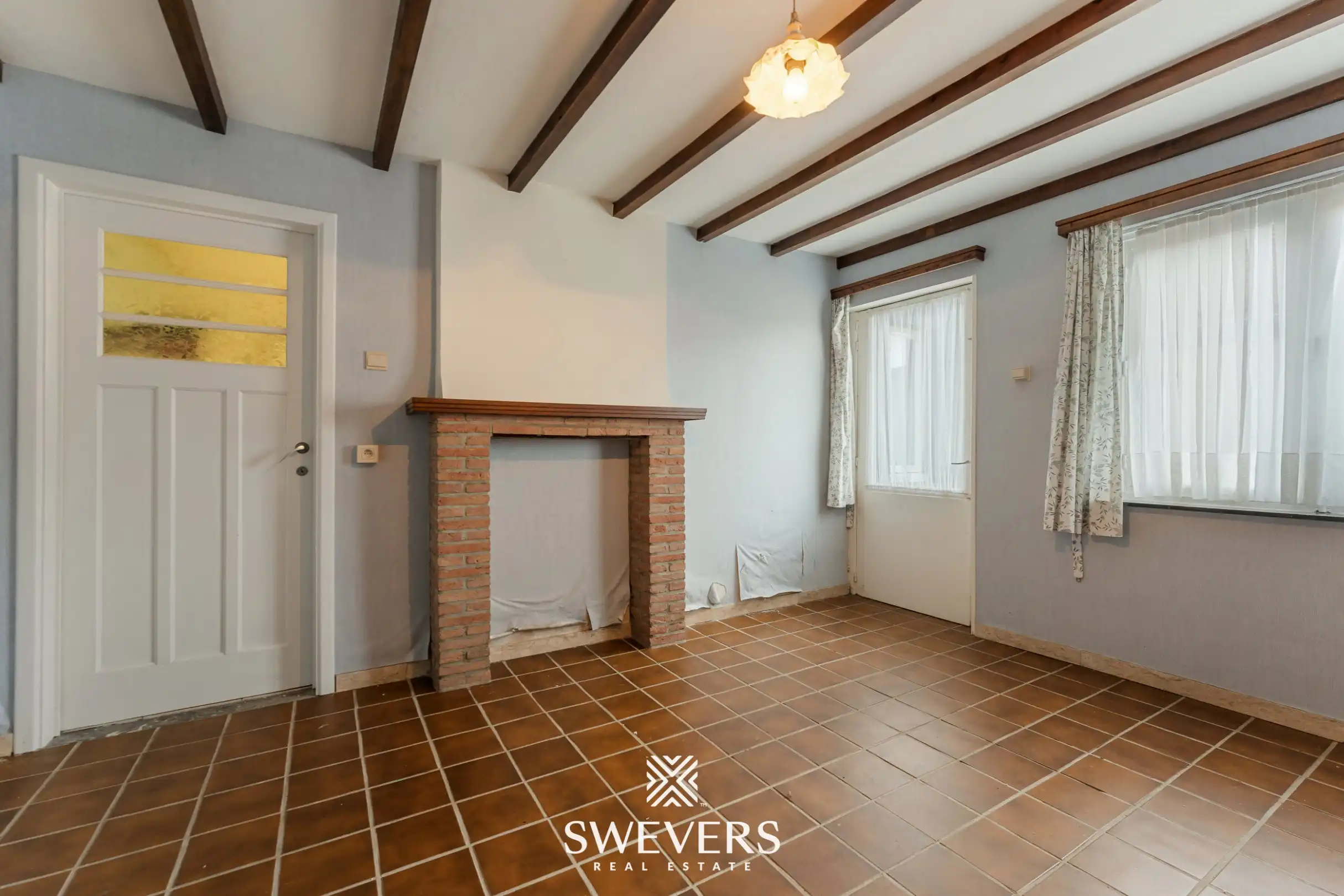 Te renoveren woning met 4 slaapkamers, grote tuin en omliggende velden op rustige ligging nabij centrum Diepenbeek foto 16