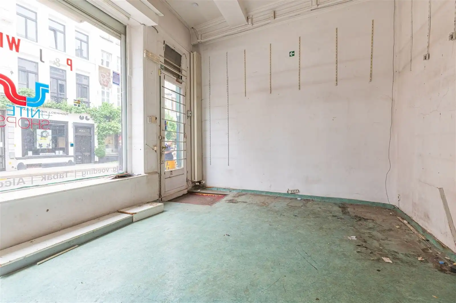 Opbrengstenwoning en handelsruimte foto 16