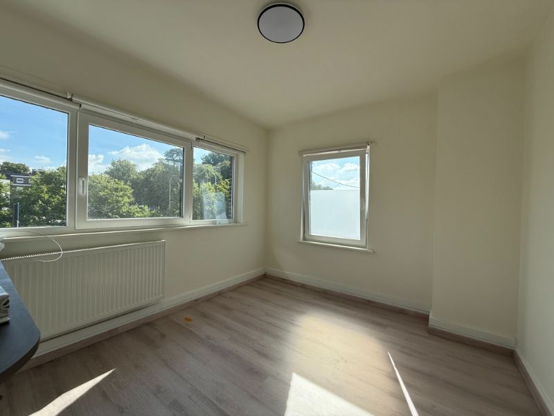 Leuke woning met tuintje en zicht op water foto 5