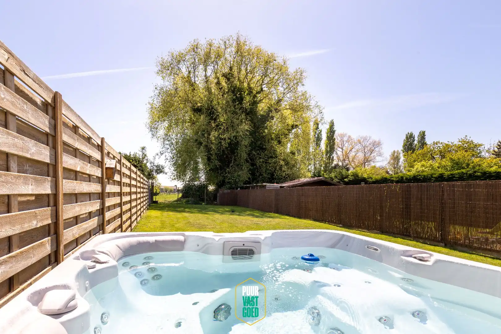 Prachtige, compleet gerenoveerde, zonnige woning met tuin foto 24