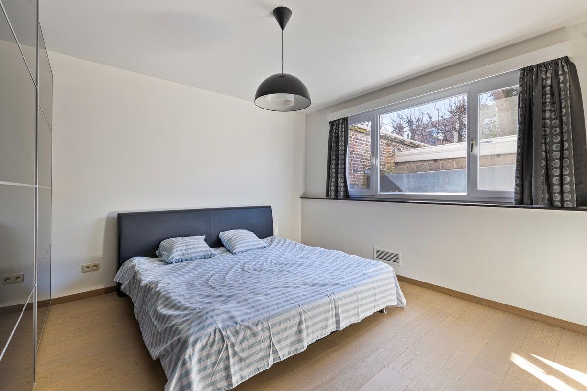 Residentieel en lichtrijk appartement met garagebox en zicht op de Leie – Toplocatie nabij Sint-Pietersstation foto 10