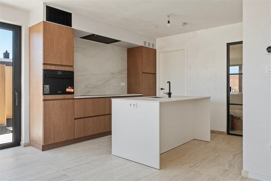 3 SLK APPARTEMENT MET RUIME TUIN EN PARKEERPLAATS IN HET CENTRUM VAN LANDEN - mogelijk aankoop 6% BTW foto 4