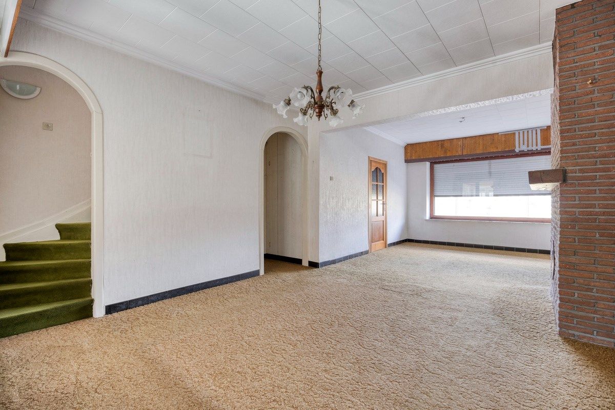 Ruim ingedeelde woning met 3slpks op een gunstige ligging. foto 4